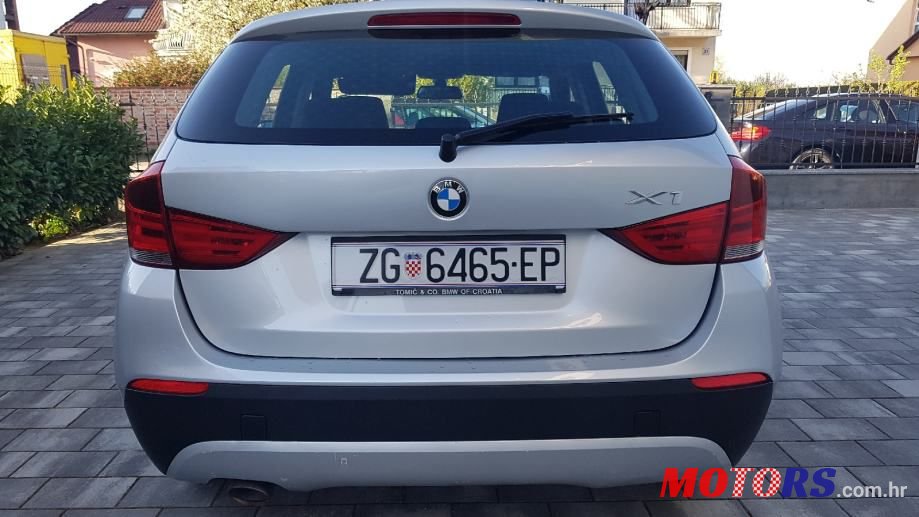 2011' BMW X1 Xdrive18D photo #6