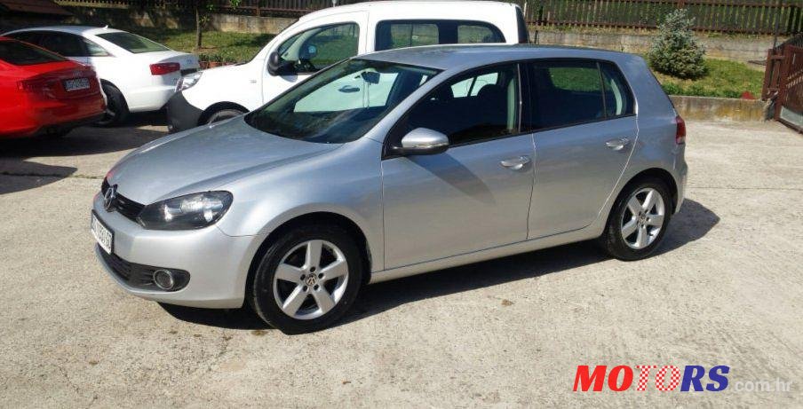 2012' Volkswagen Golf VI 1,6 Tdi photo #1