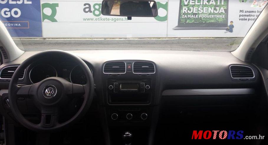 2011' Volkswagen Golf VI 1,6 Tdi photo #1
