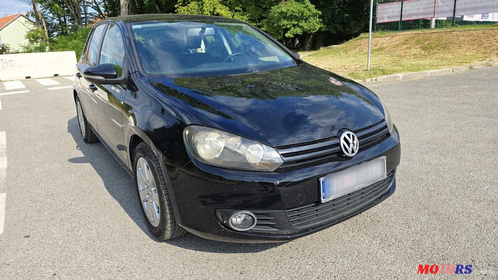 2010' Volkswagen Golf VI 1,6 Tdi photo #1