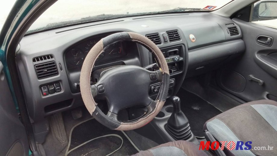 2000' Mazda 323 photo #3