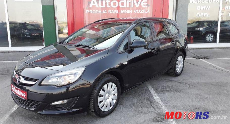 2013' Opel Astra Karavan photo #1