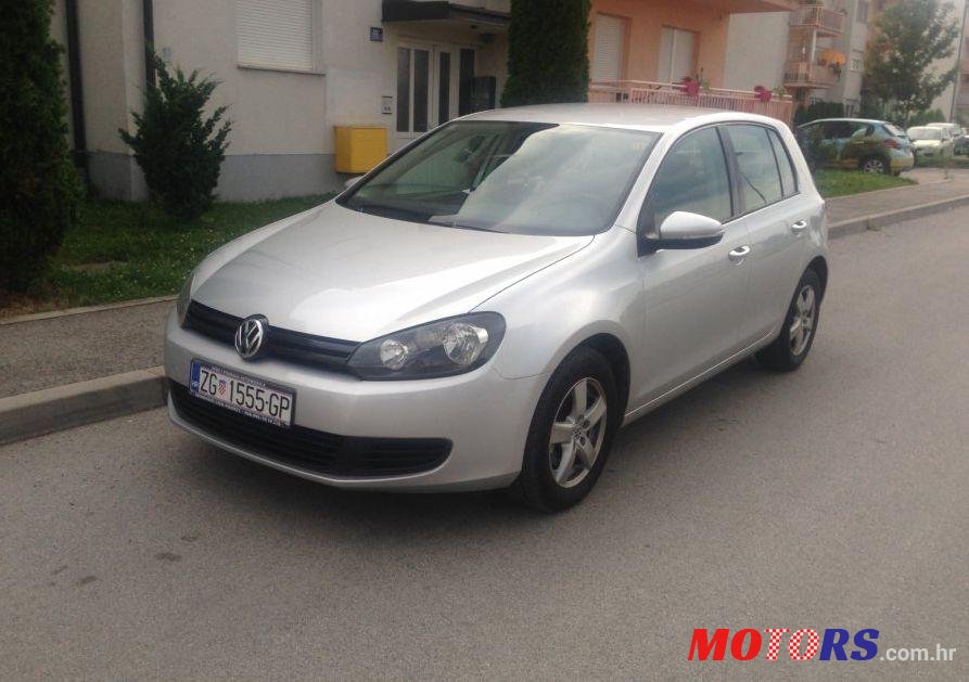 2011' Volkswagen Golf VI 1,6 Tdi photo #1