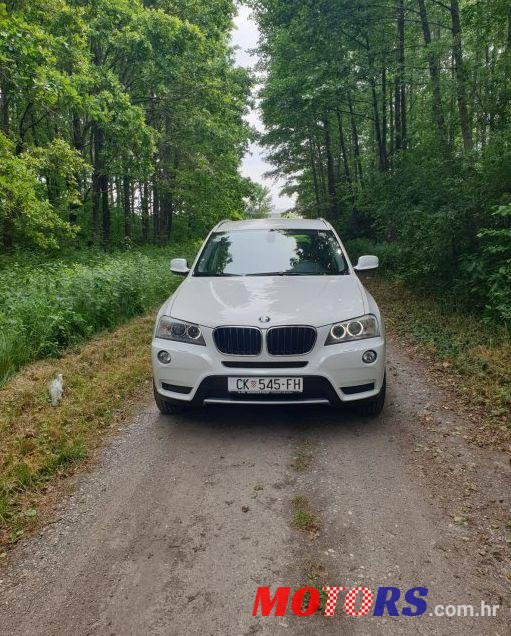 2011' BMW X3 Xdrive20D photo #1