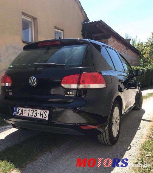 2012' Volkswagen Golf VI 1,6 Tdi photo #2