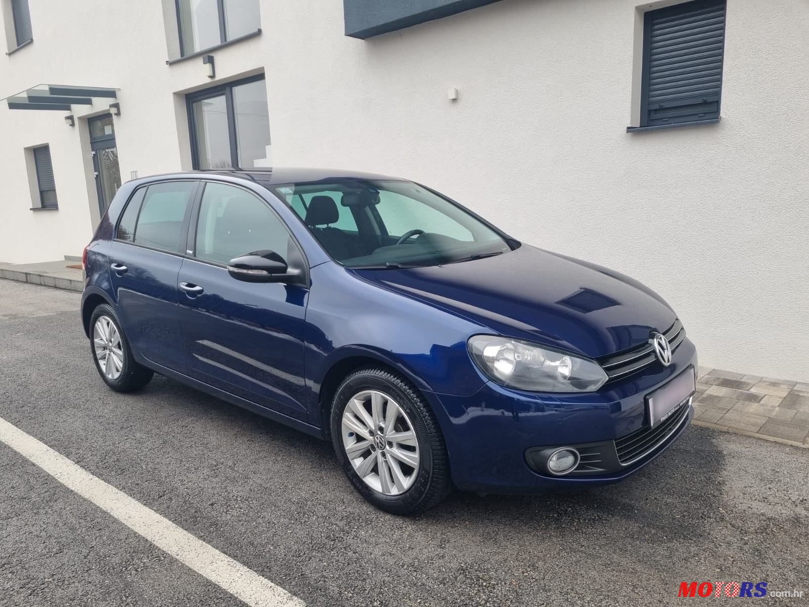 2012' Volkswagen Golf VI 1,6 Tdi photo #4