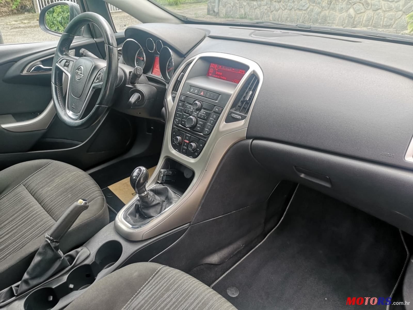 2012' Opel Astra Karavan photo #2