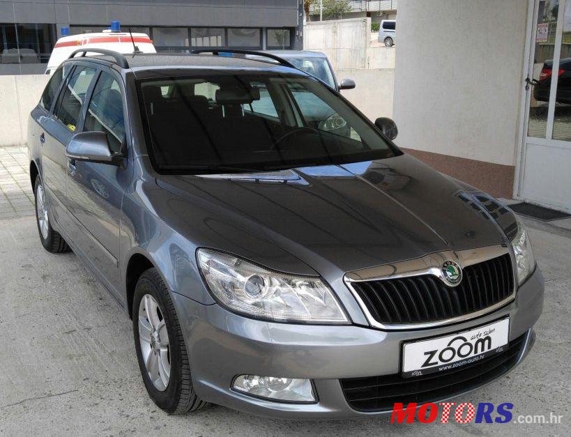 2013' Skoda Octavia Combi 1,6 Tdi photo #1