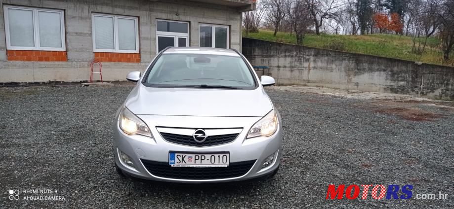 2011' Opel Astra Karavan photo #1