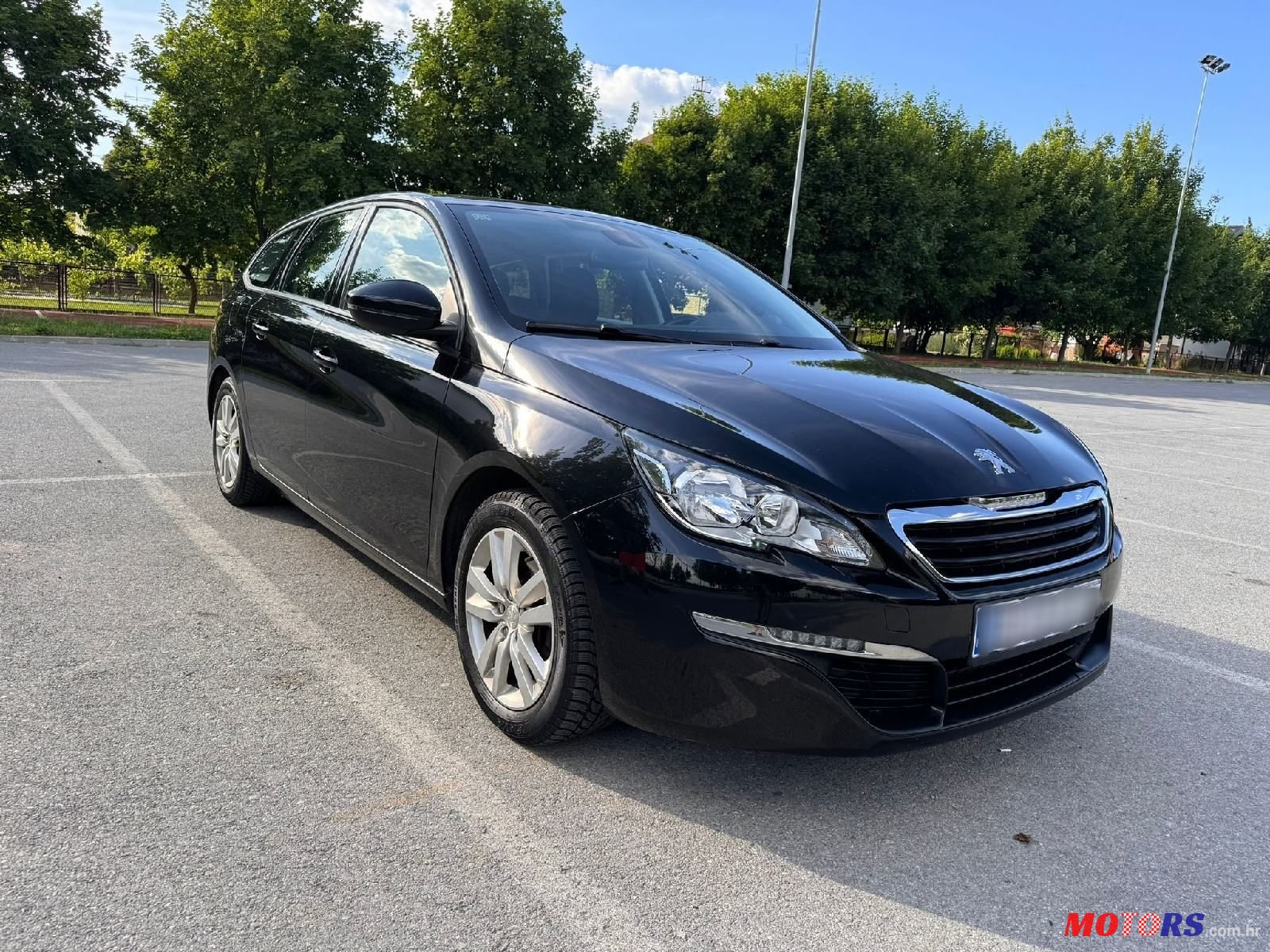 2016' Peugeot 308 Sw photo #1