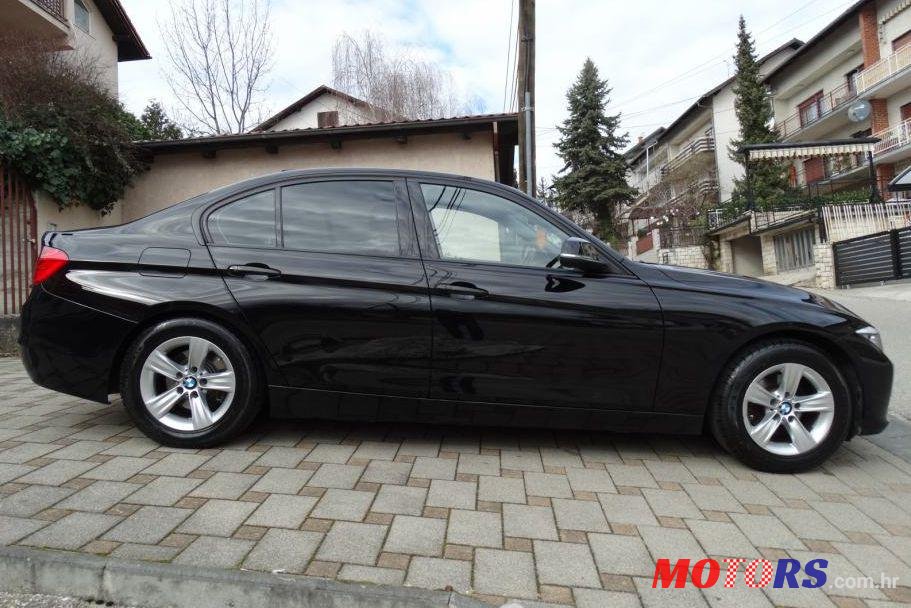 2013' BMW Serija 3 318D photo #1
