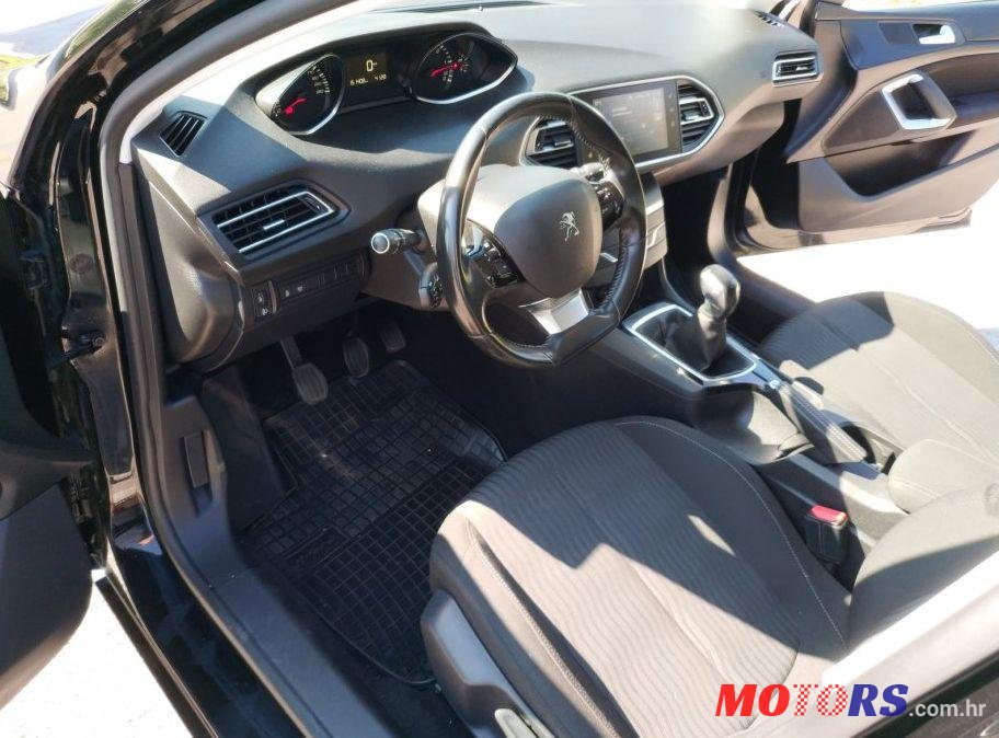 2015' Peugeot 308 Sw photo #1