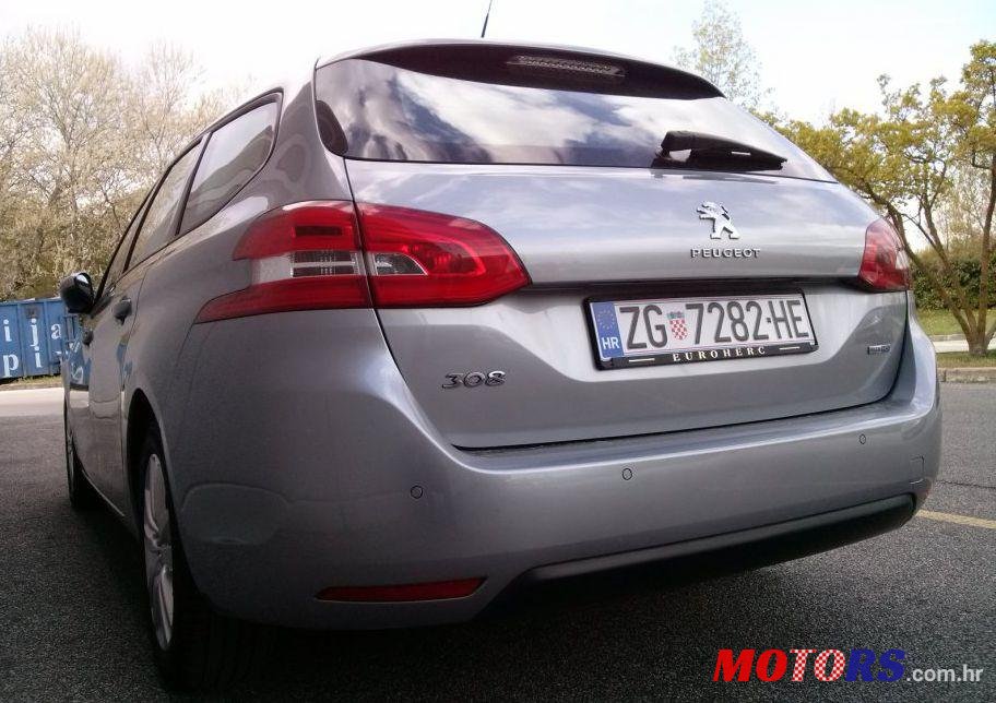2015' Peugeot 308 Sw photo #1