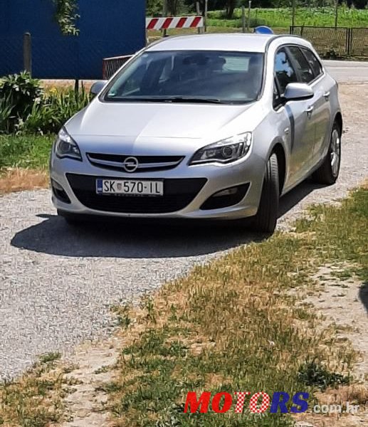 2015' Opel Astra Karavan photo #3