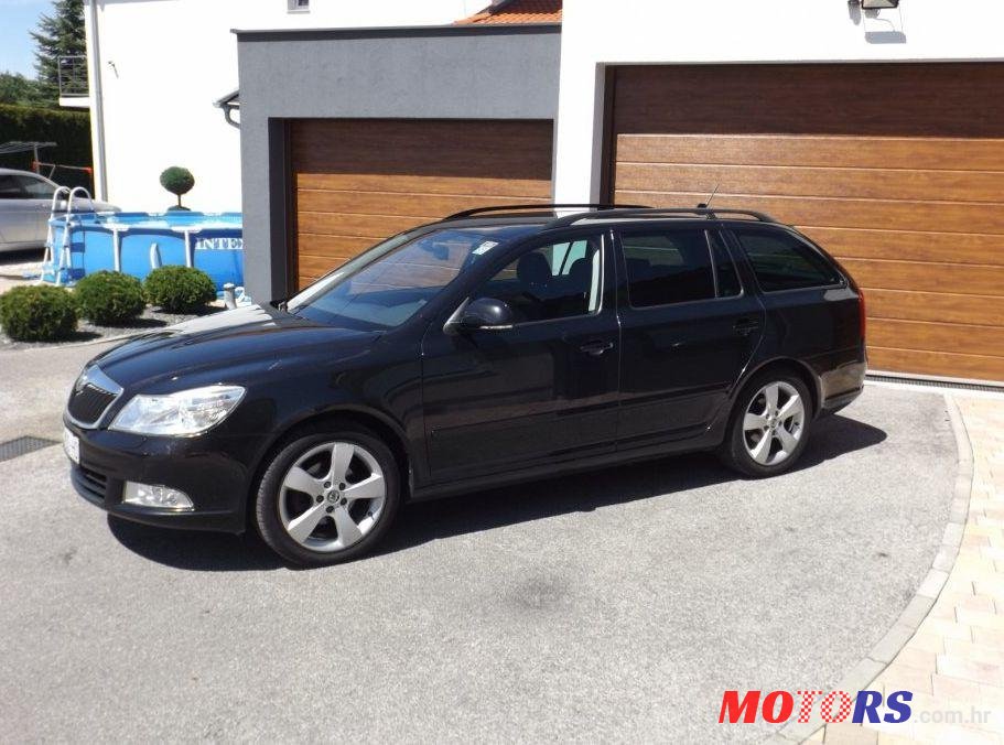 2013' Skoda Octavia Combi 1,6 Tdi photo #1