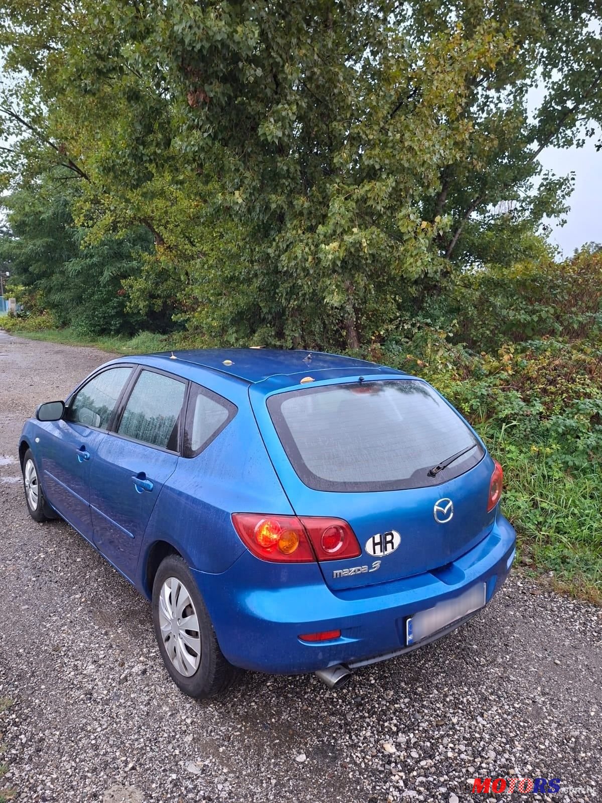 2004' Mazda 3 Sport 1,4 I Ce photo #6