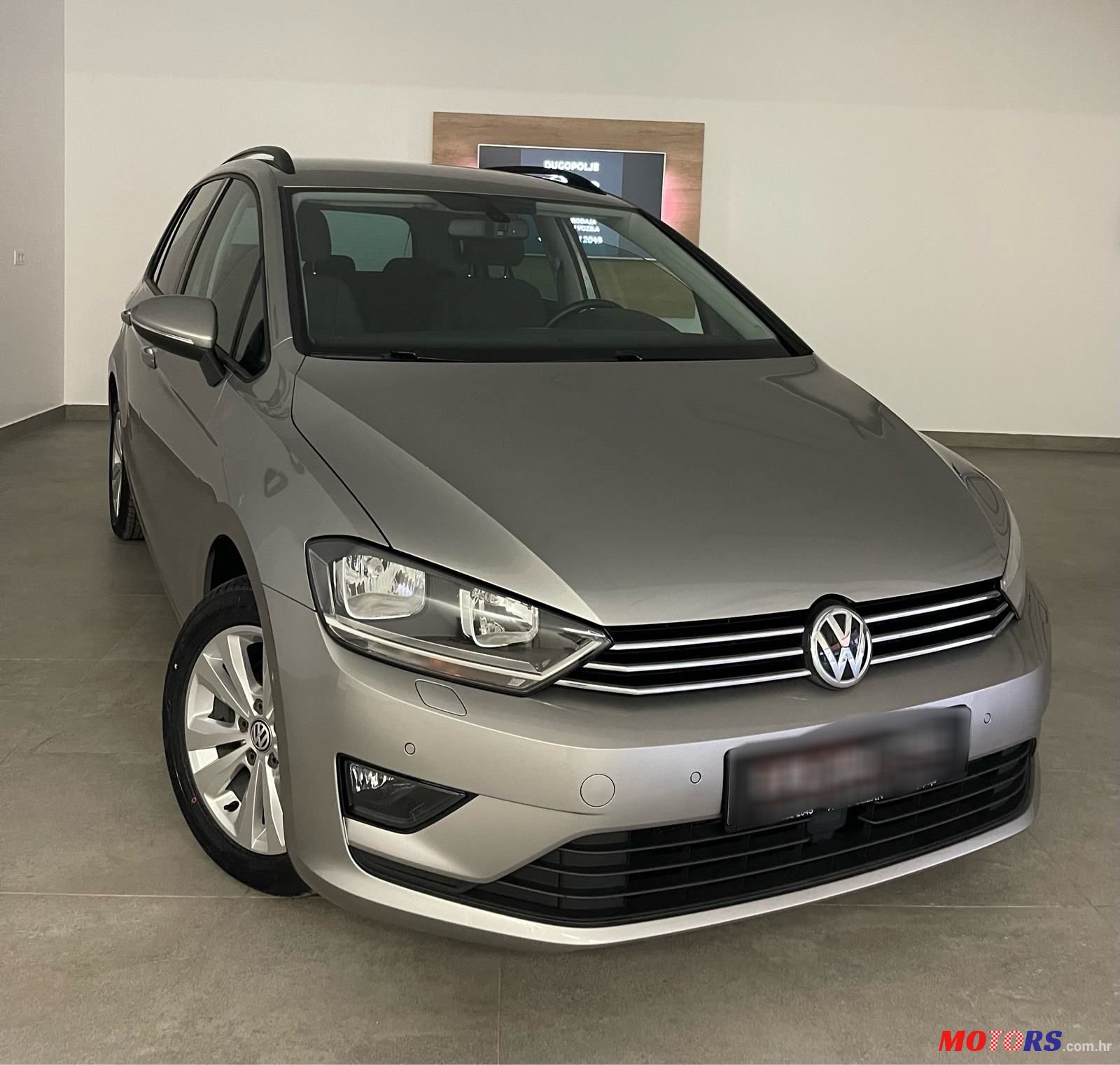 2015' Volkswagen Golf Sportsvan photo #6