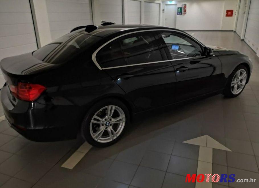 2014' BMW Serija 3 318D photo #2