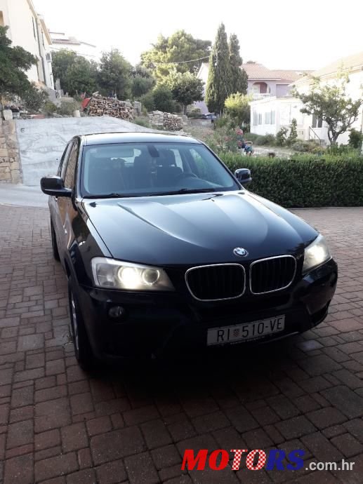 2011' BMW X3 Xdrive20D photo #1