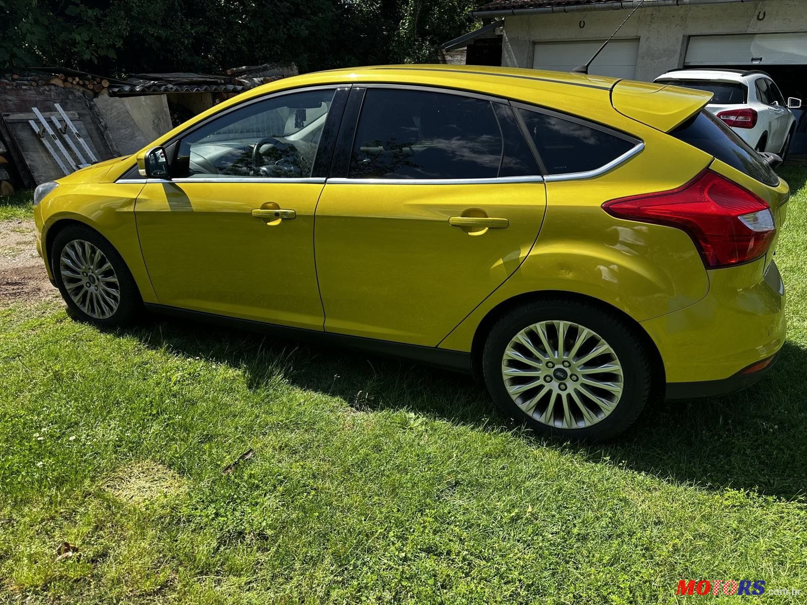 2011' Ford Focus 1,6 photo #1