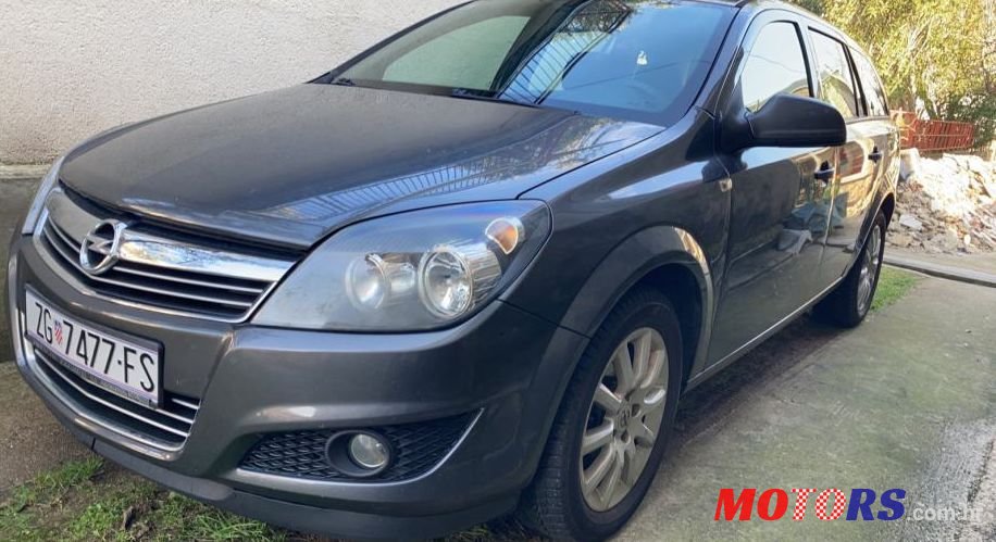 2012' Opel Astra Karavan 1,7 Cdti photo #1