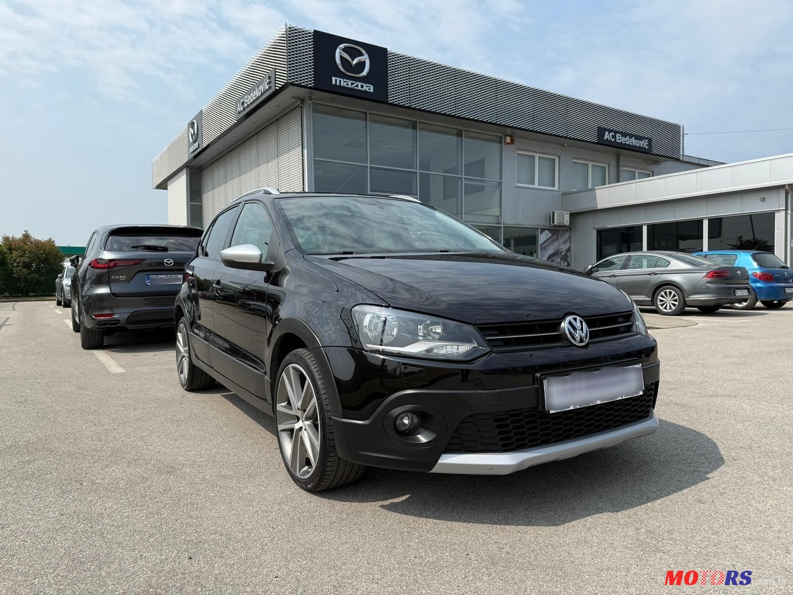 2011' Volkswagen Polo 1,4 photo #1