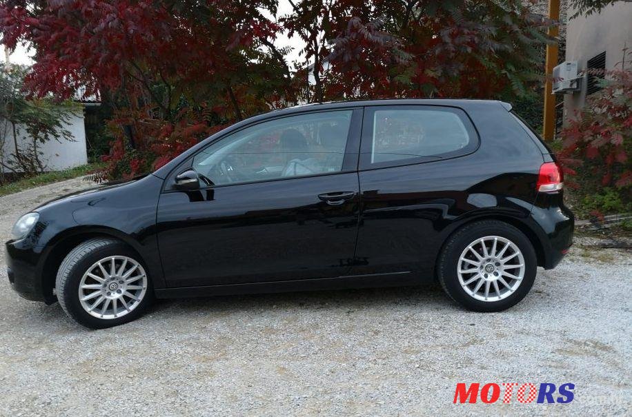 2012' Volkswagen Golf VI 1,6 Tdi photo #1