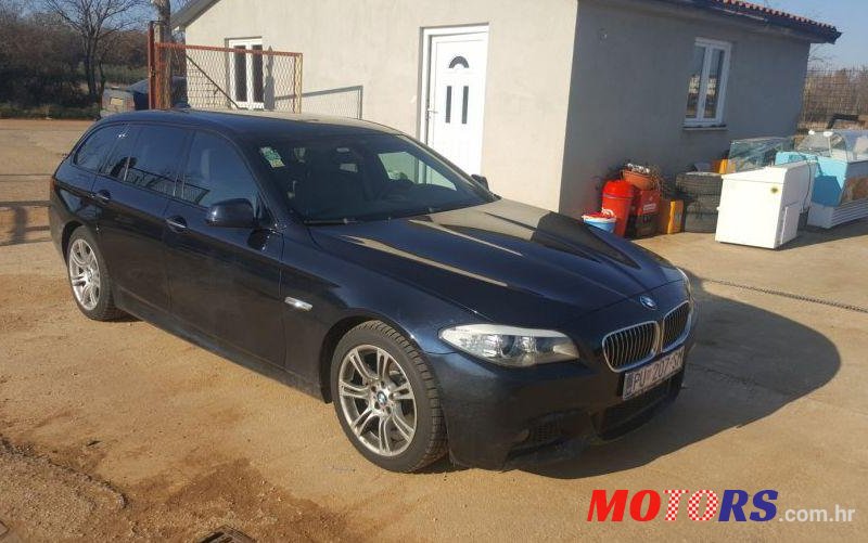 2011' BMW 5 Series 520D photo #2