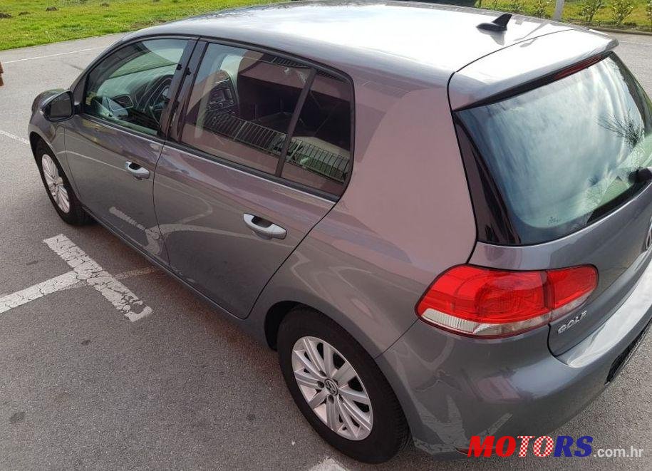 2012' Volkswagen Golf VI 1,6 Tdi photo #2