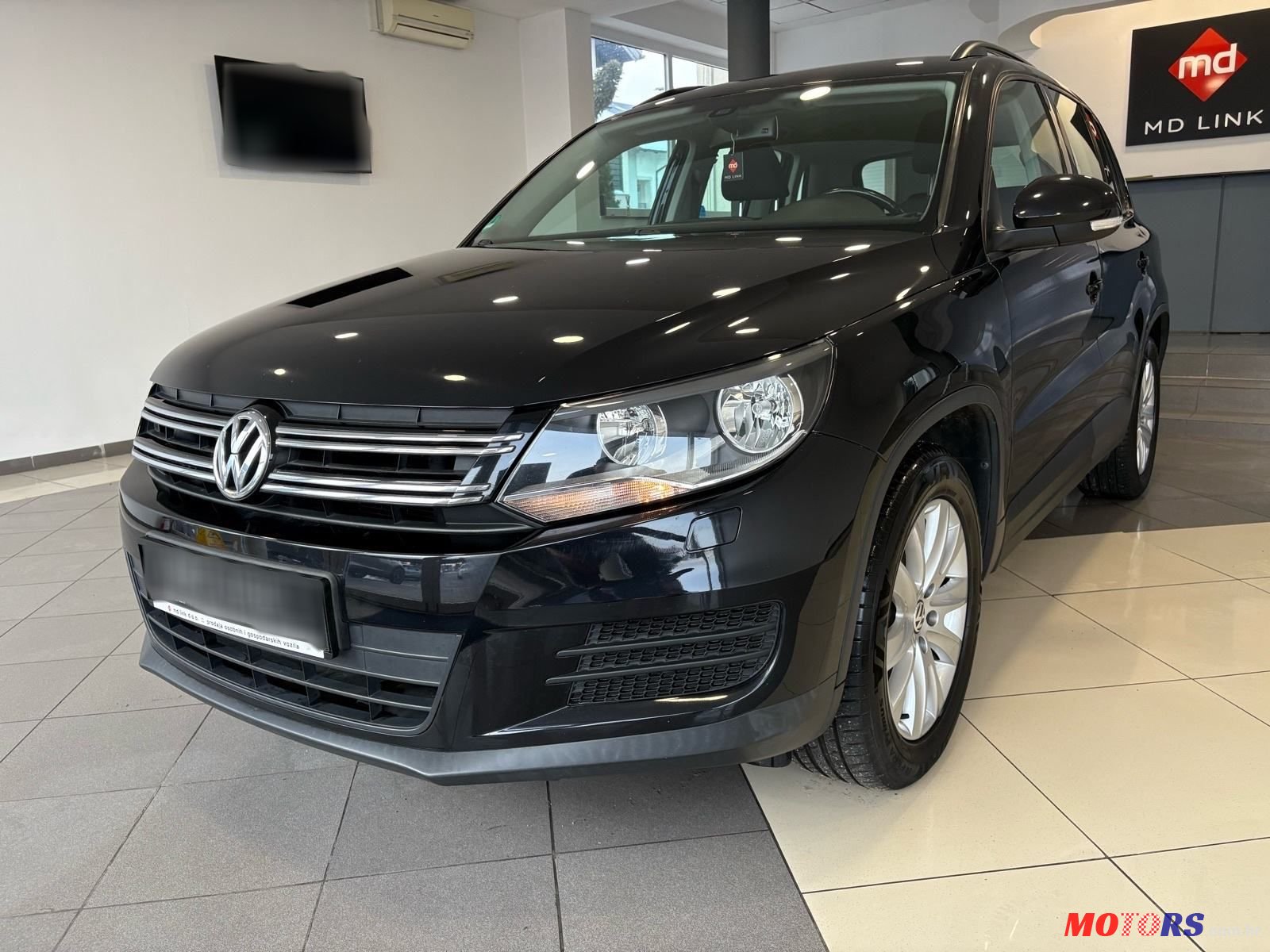 2014' Volkswagen Tiguan photo #1