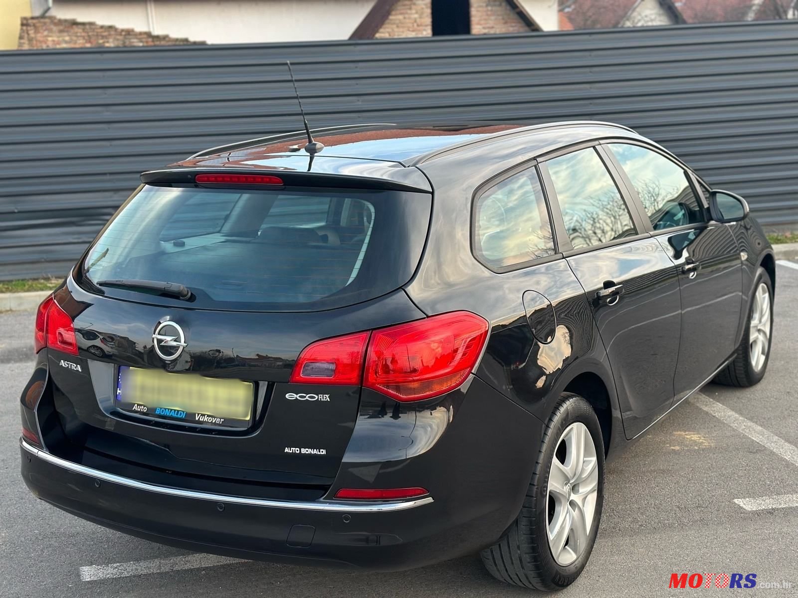 2015' Opel Astra Karavan photo #4