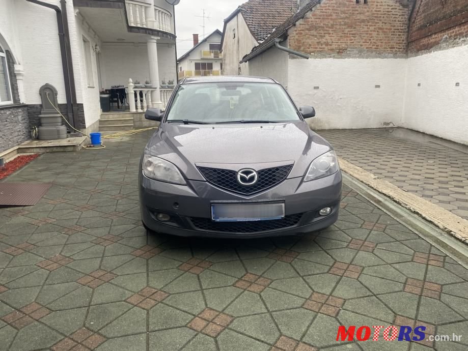 2006' Mazda 3 16D photo #4