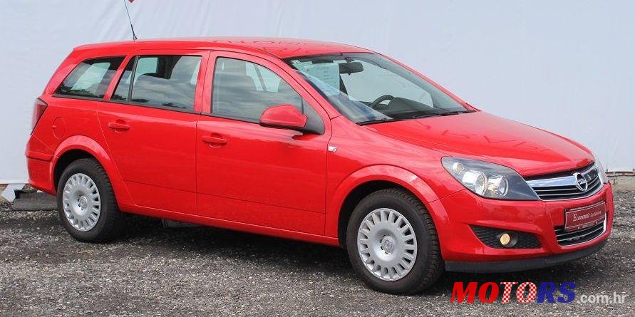 2011' Opel Astra Karavan photo #2