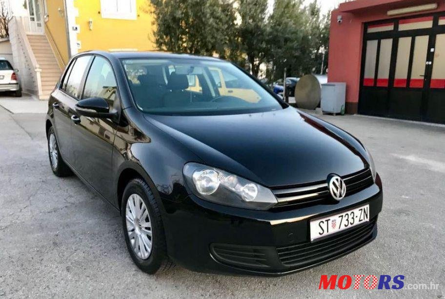 2011' Volkswagen Golf VI 1,6 Tdi photo #1