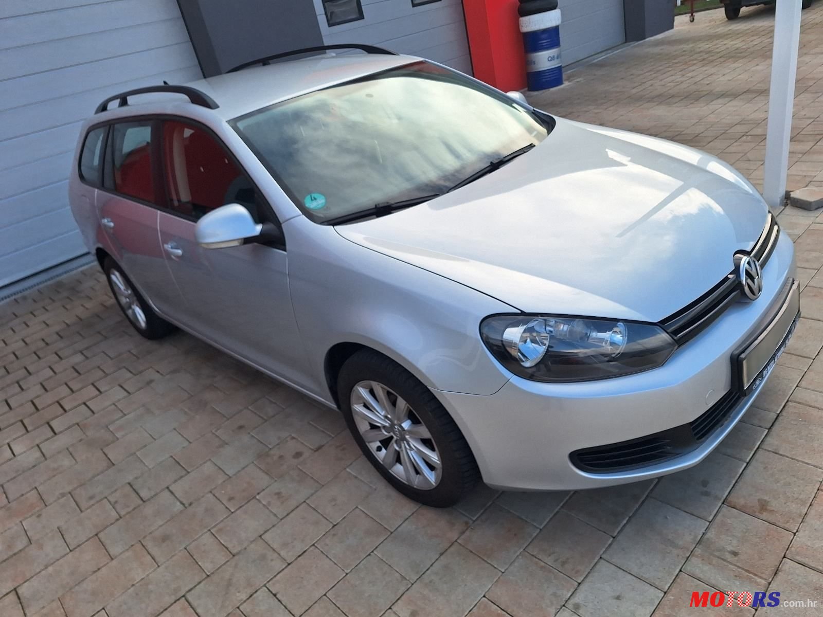 2011' Volkswagen Golf VI Variant photo #5