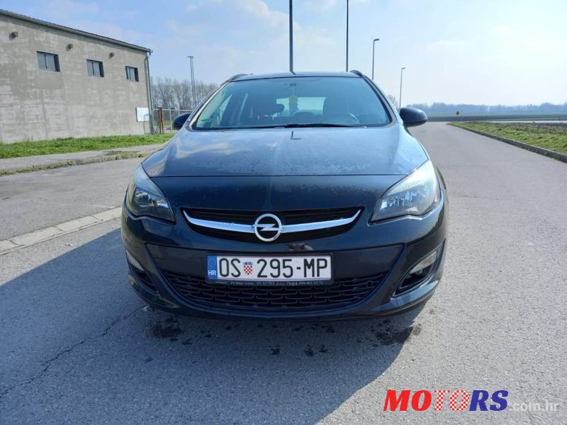 2014' Opel Astra Karavan photo #2