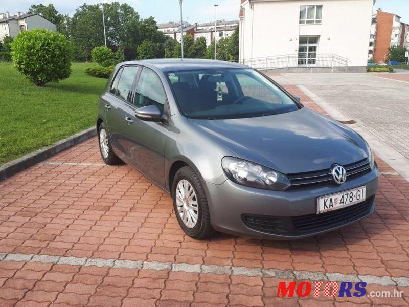 2009' Volkswagen Golf VI 1,6 Tdi photo #1