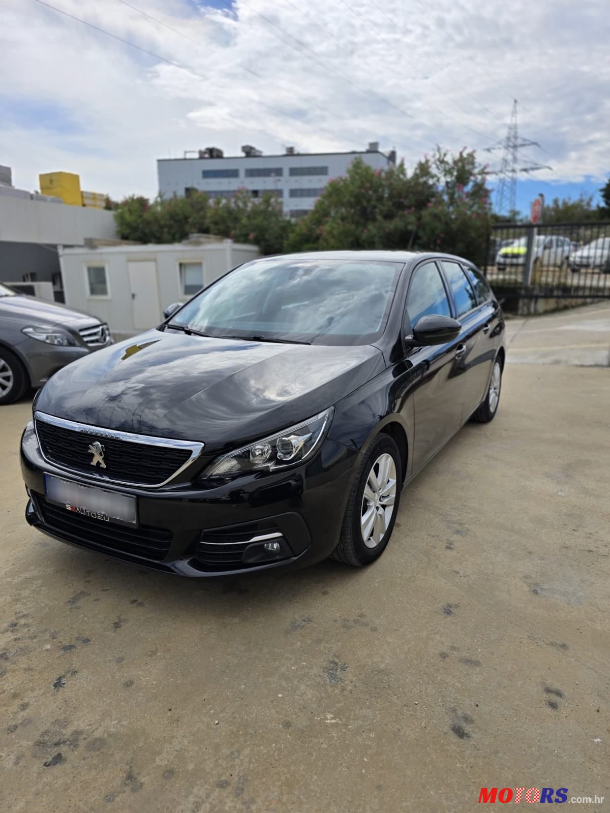 2021' Peugeot 308 Sw photo #1