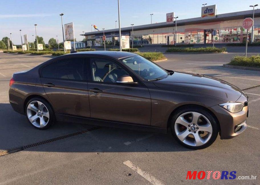 2014' BMW Serija 3 318D photo #1