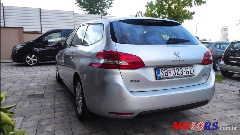 2015' Peugeot 308 Sw photo #1