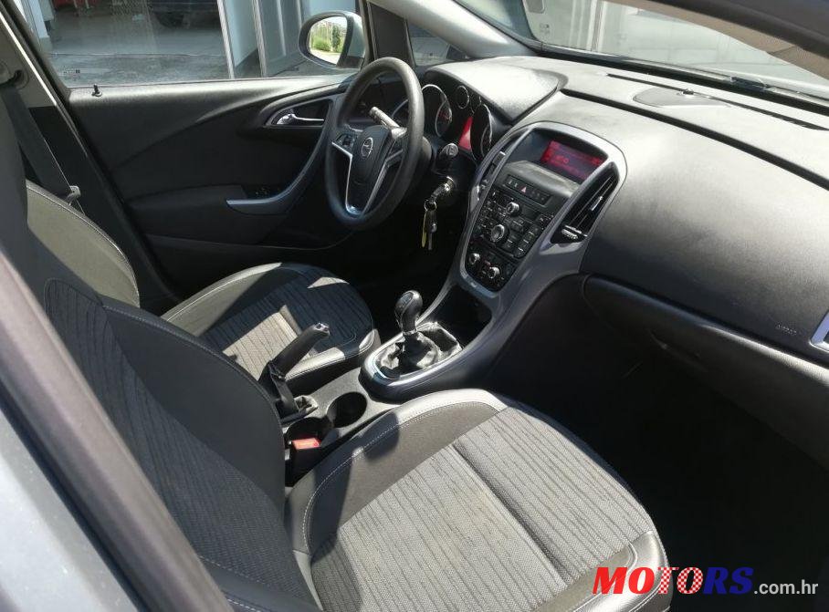 2014' Opel Astra Karavan photo #1