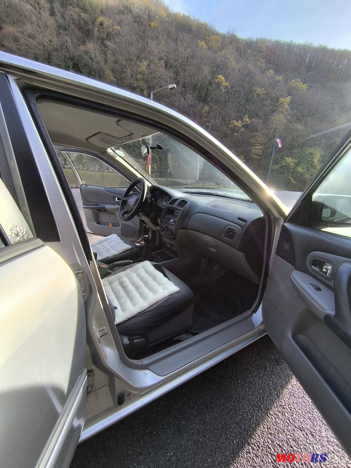 2003' Mazda 323 F 1,3 I photo #6