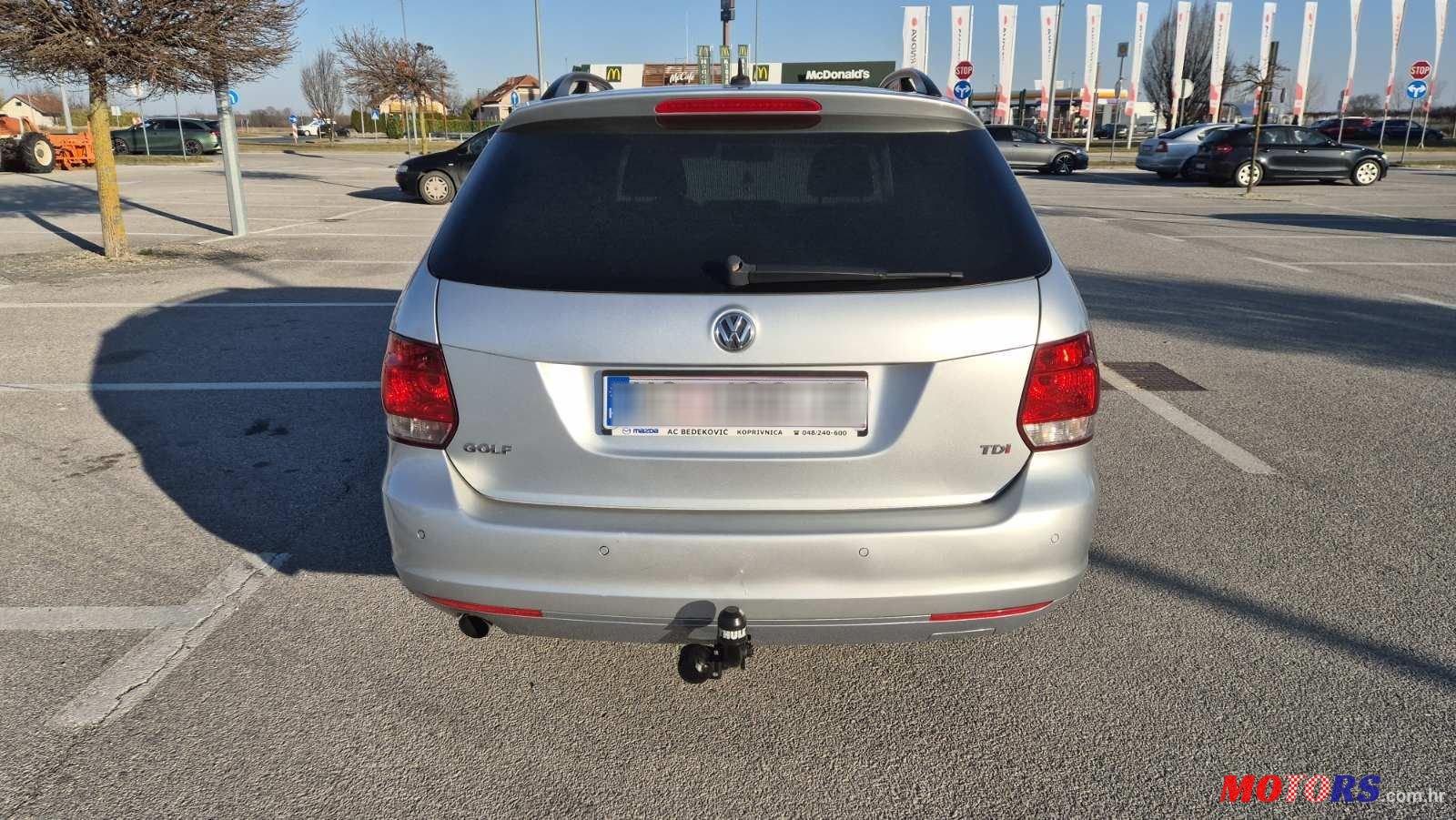 2011' Volkswagen Golf VI Variant photo #6