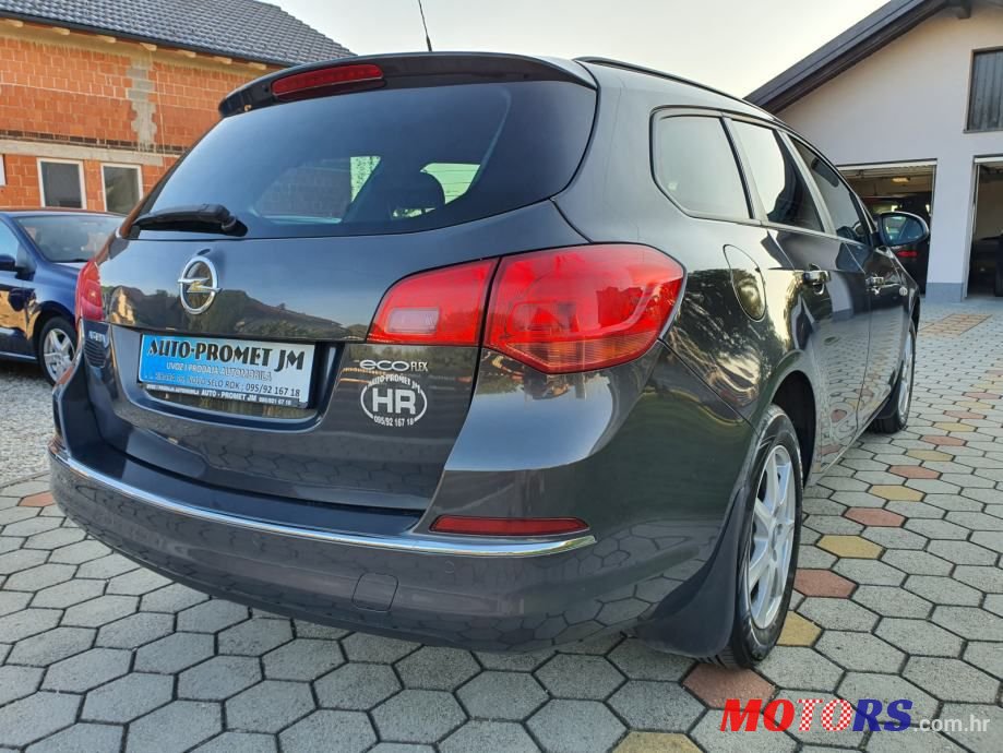 2014' Opel Astra Karavan photo #5