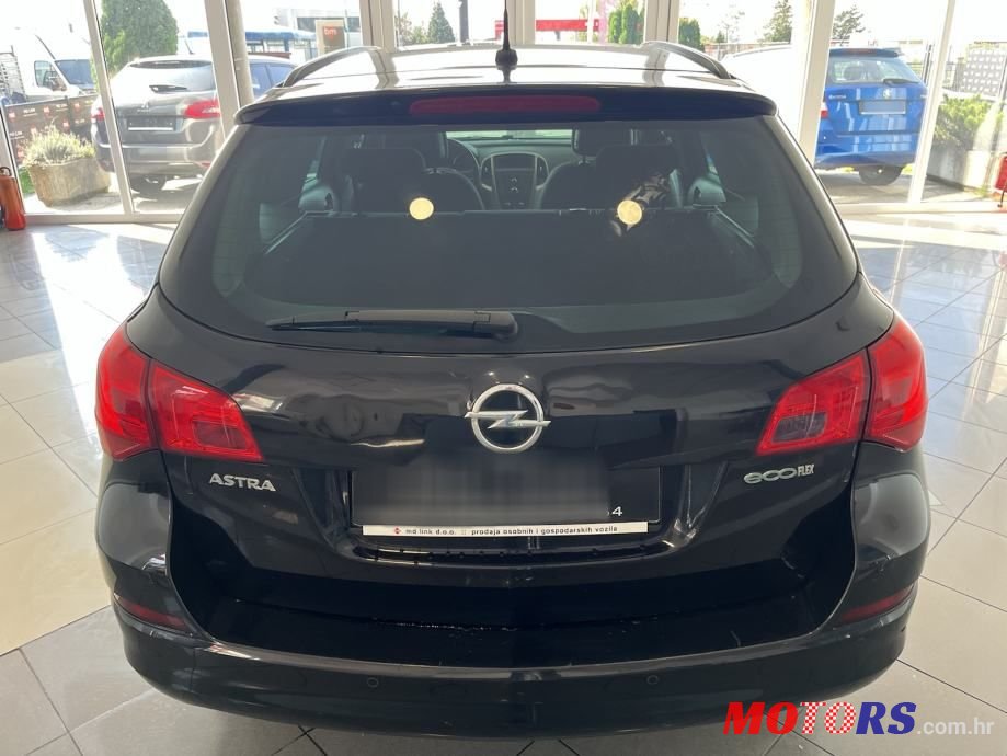 2011' Opel Astra Karavan photo #4