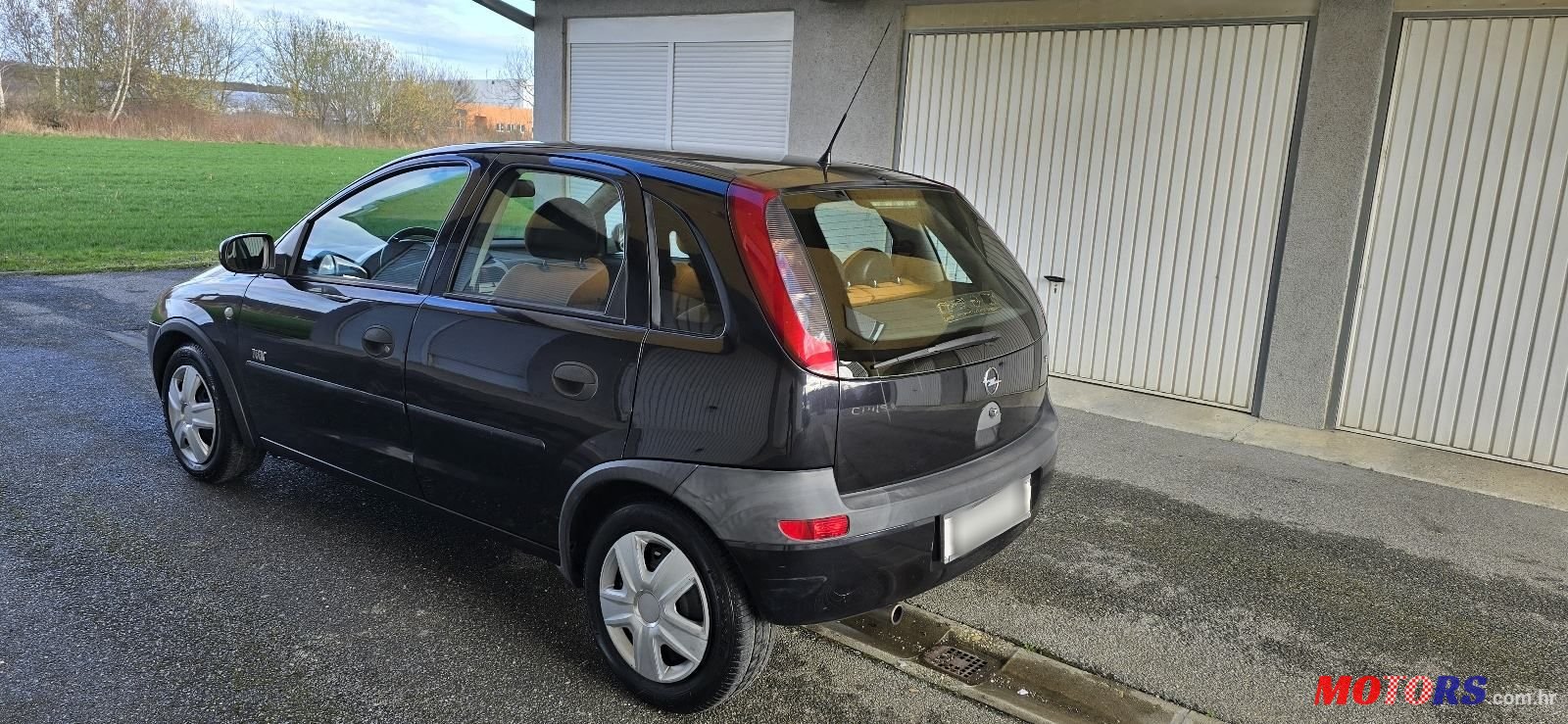 2004' Opel Corsa 1,2 16V photo #2