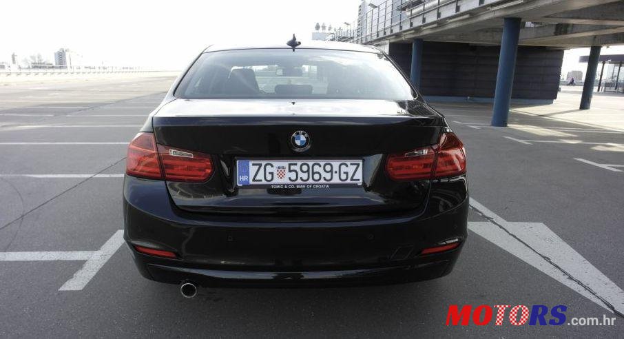 2014' BMW Serija 3 318D photo #1