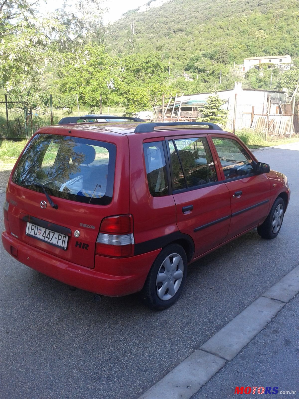 1999' Mazda Demio photo #2