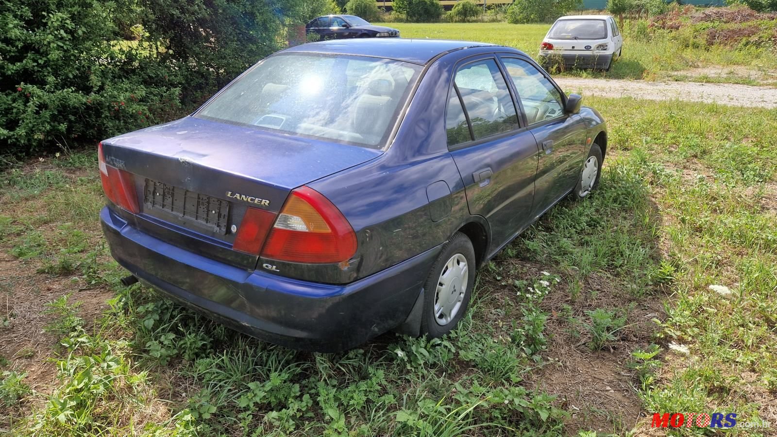 2001' Mitsubishi Lancer 1.3Gl photo #1