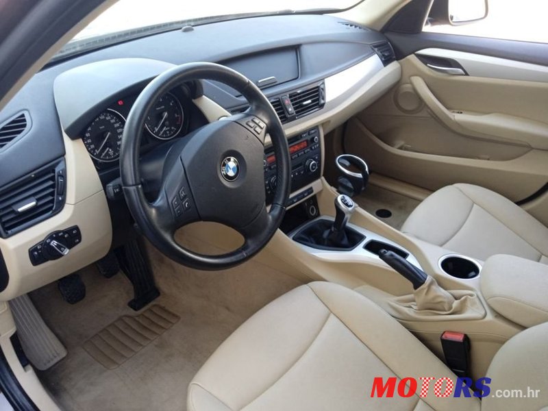 2013' BMW X1 Sdrive16D photo #5